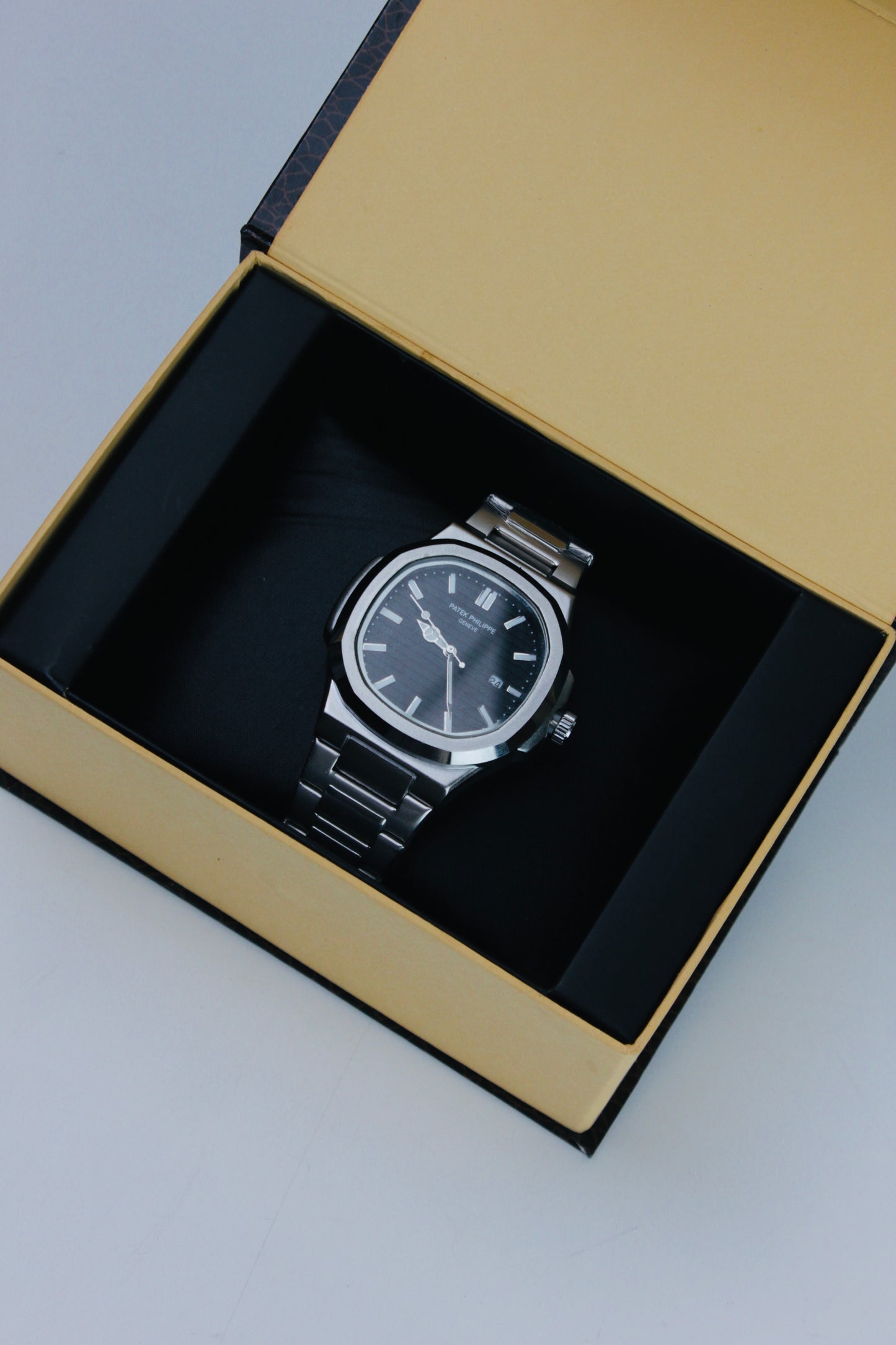 Patek Philippe Black And Silver Nautilus Stainless Steel Watch