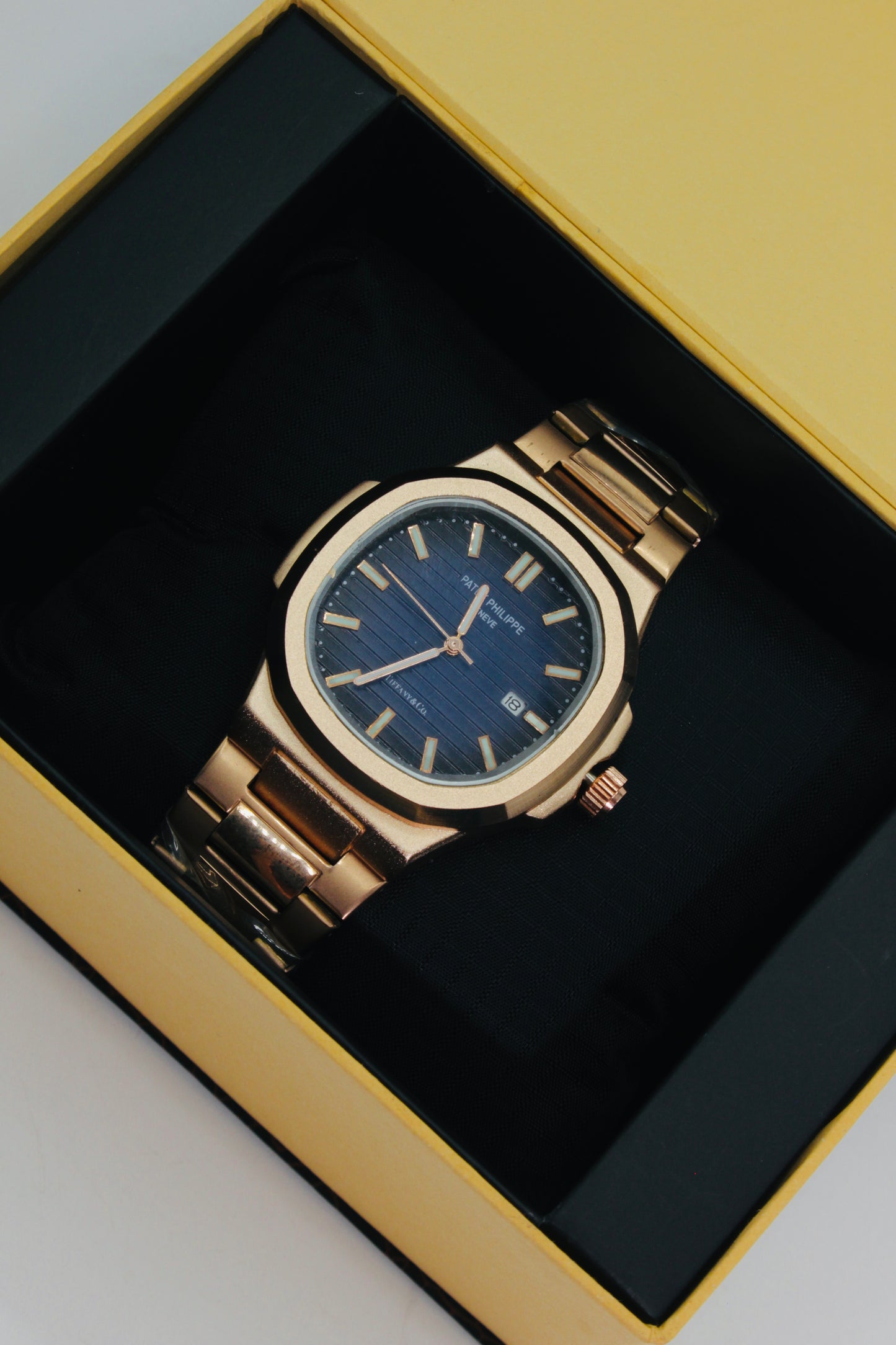 Patek Philippe Nautilus Style Quartz Men’s Watch – Frosted Gold Case with Midnight Blue Dial